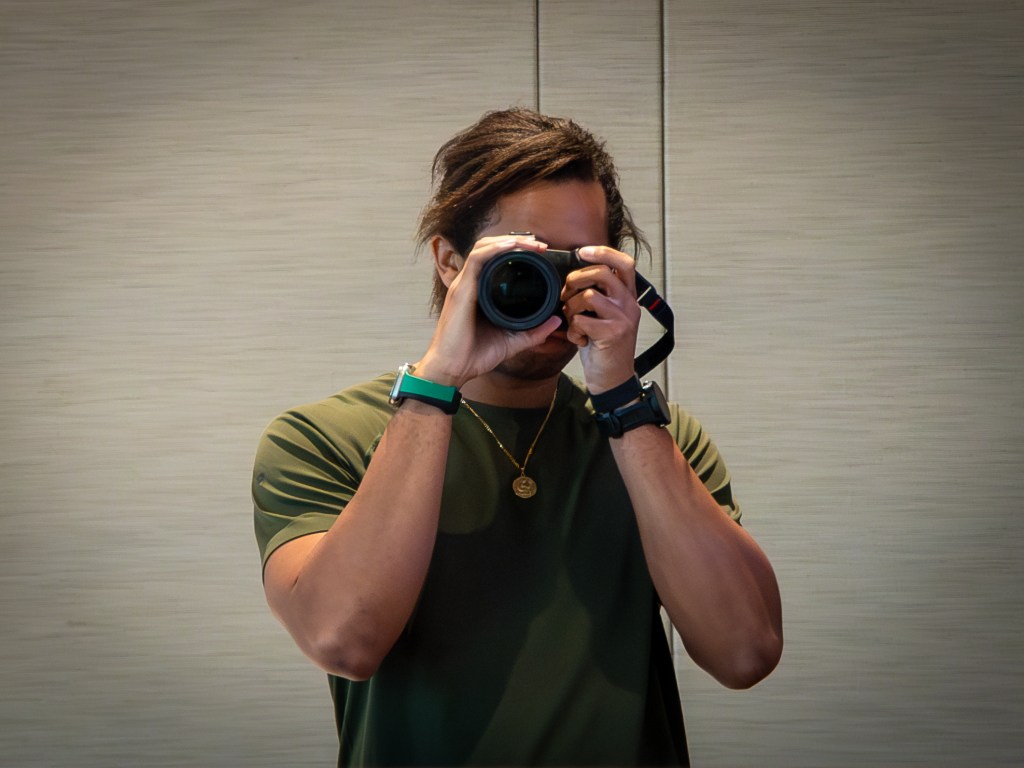 morgan white taking a self portrait in the mirror